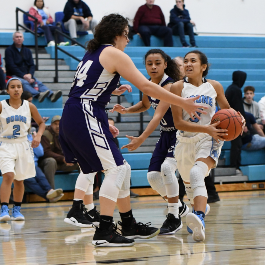 Sophomore guard Skylar Holder drives to the basket in the game against Campbell County on Dec. 18, 2018 while junior Alissa Avila (LEFT) looks on.
