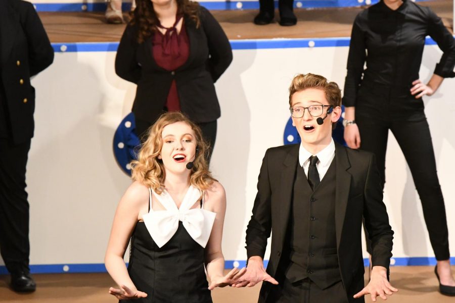 Senior Casey Beusterien (Reno Sweeney) and junior Robert Saner (Lord Evelyn Oakleigh) perform the final number during a performance of Anything Goes! at Boone on Dec. 6.