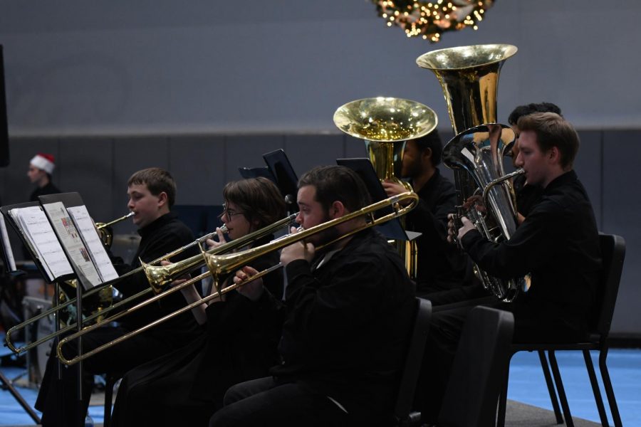 Some brass players play during one of the performances at the bands Winter Pops Concert on Dec. 10.