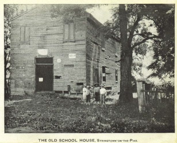 The photo depicts one of the early school houses in the Florence area in the 1800s.