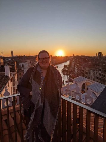 Family and consumer science teacher Alexis Burgess stands on a balcony in Venice, Italy  in January of  2020.