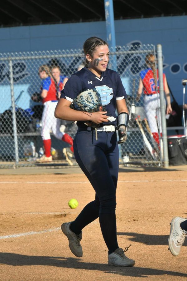Sophomore Dani Wright walks from the pitchers circle after finishing an inning during the Lady Rebels 12-2 win over the Conner Cougars on April 13.