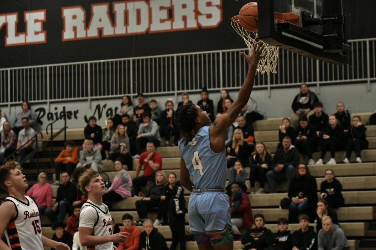 Senior Thomas Williams jumps for a layup during Boone Countys 70-60 win over the Raiders at Ryle on Dec. 15.