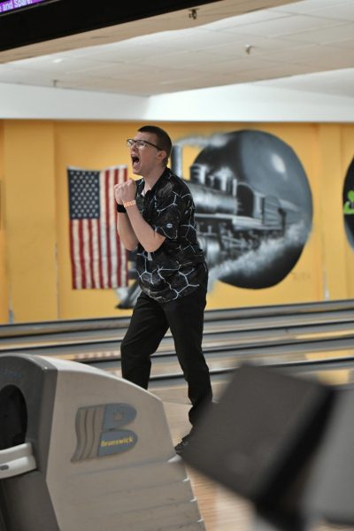 Senior Antonio Williams celebrates a strike at the KHSAA Region Six Bowling Tournament on Jan. 18 at Strike and Spare in Erlanger.