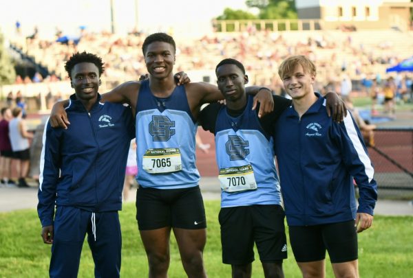 The boys 4x100 meter relay (I. Ngam, Lawson, M. Ngam, Rice) poses after finishing 2nd and automatically qualifying for the state championship during the KHSAA Region 5 Championship at Scott High School on May 22.