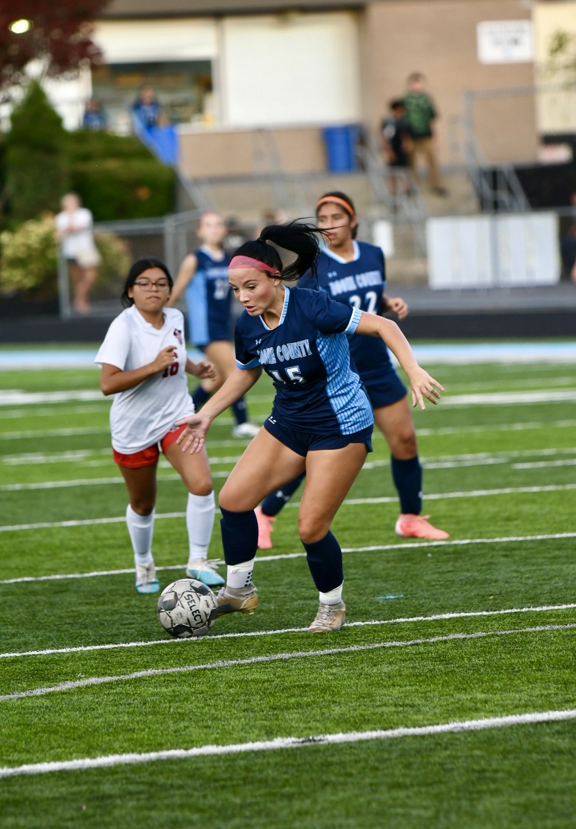 Senior Maliyah Fayson drives towards the goal during the girls soccer team's home win over Holmes on Sept. 18.