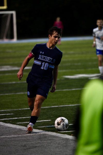 Parker Byland drives down the field during Boone’s senior night win over Walton Verona on  Sept. 26. Byland had two goals in the match and scored 10 goals and had seven assists this season.